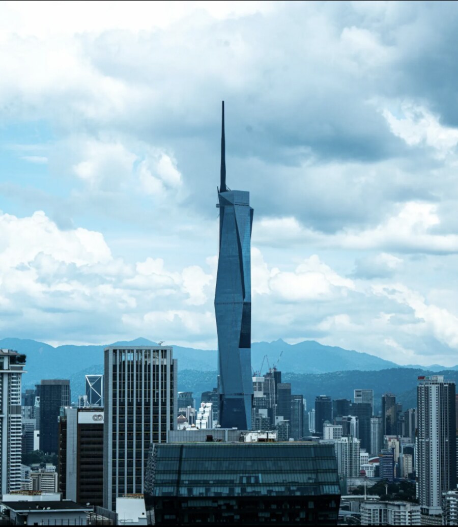 Merdeka 118 tower rising above the Kuala Lumpur skyline, viewed from a nearby vantage point